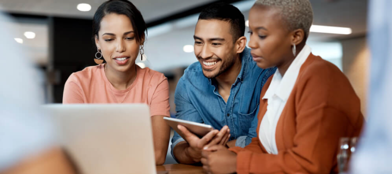 A group of nonprofit employees discuss their social media strategy