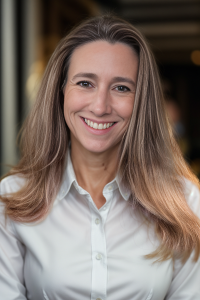 Professional headshot of a woman smiling.