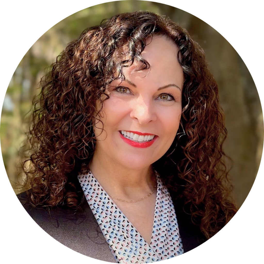 Allison Morton, Winkler Group Consultant, smiles at the camera with her head at a slight angle.