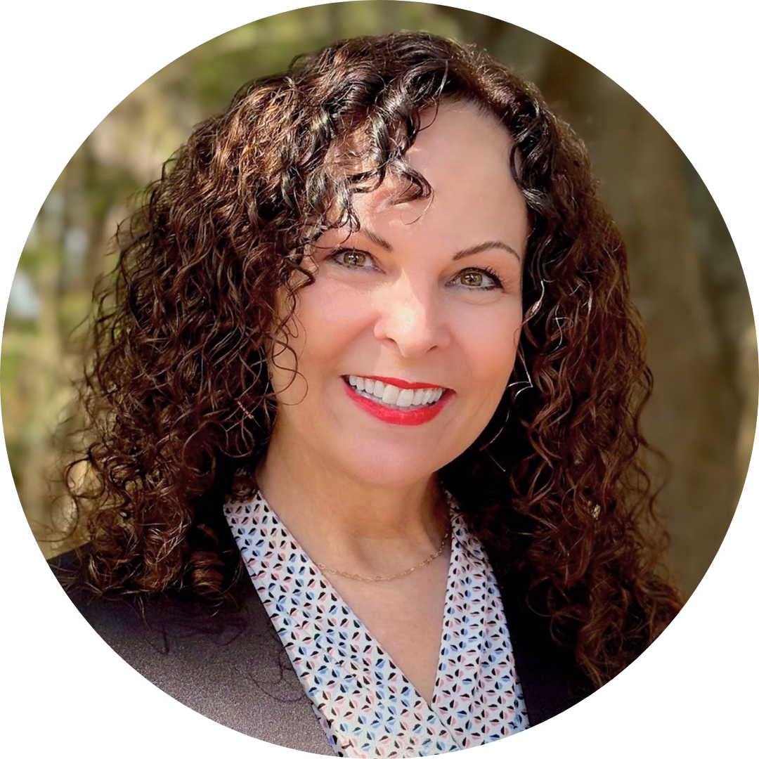 Allison Morton, Winkler Group Consultant, smiles at the camera with her head at a slight angle.